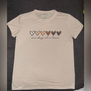 A tan colored T-shirt size medium from Shein